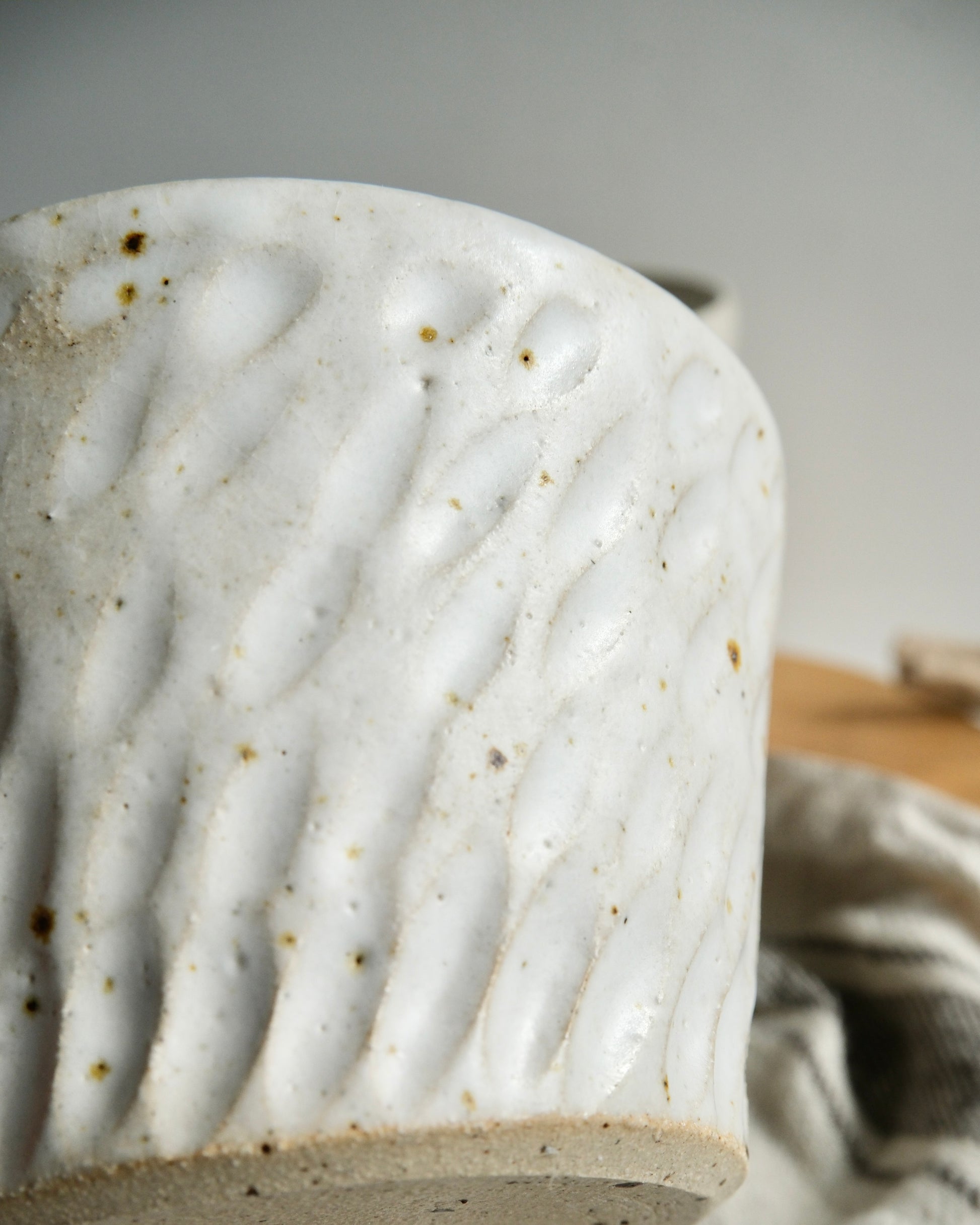 Close up of the surface texture of a white mug 