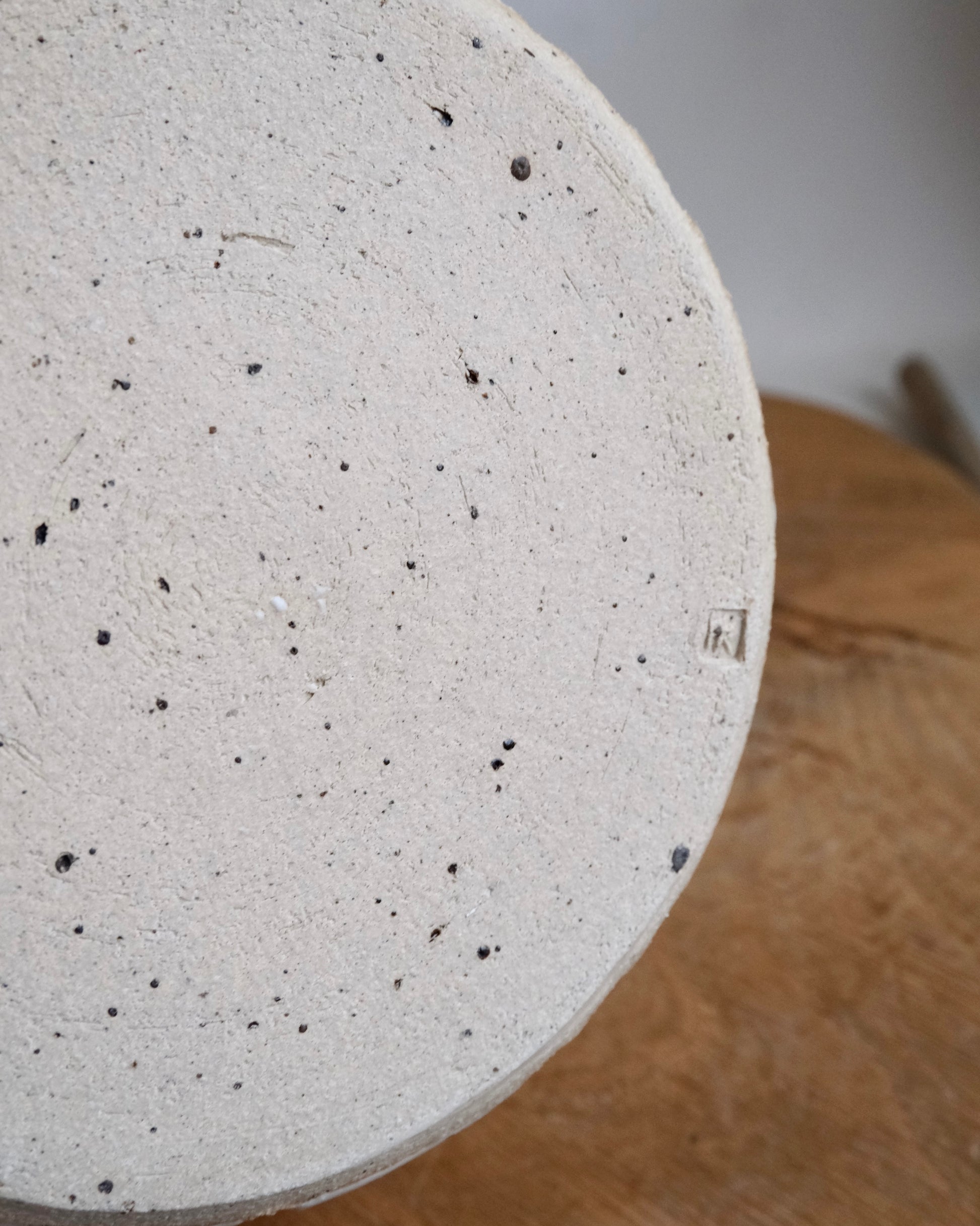 Close up of he bottom of a ceramic pot