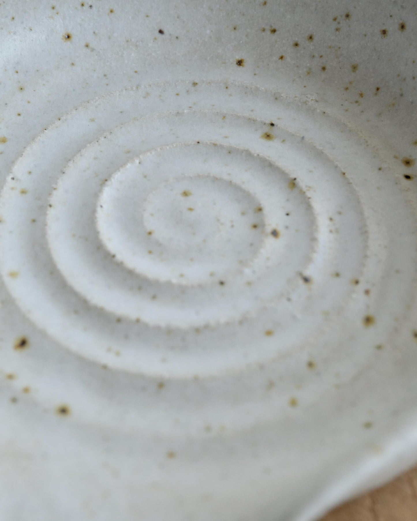 Close-up of a ceramic dish with concentric circle pattern