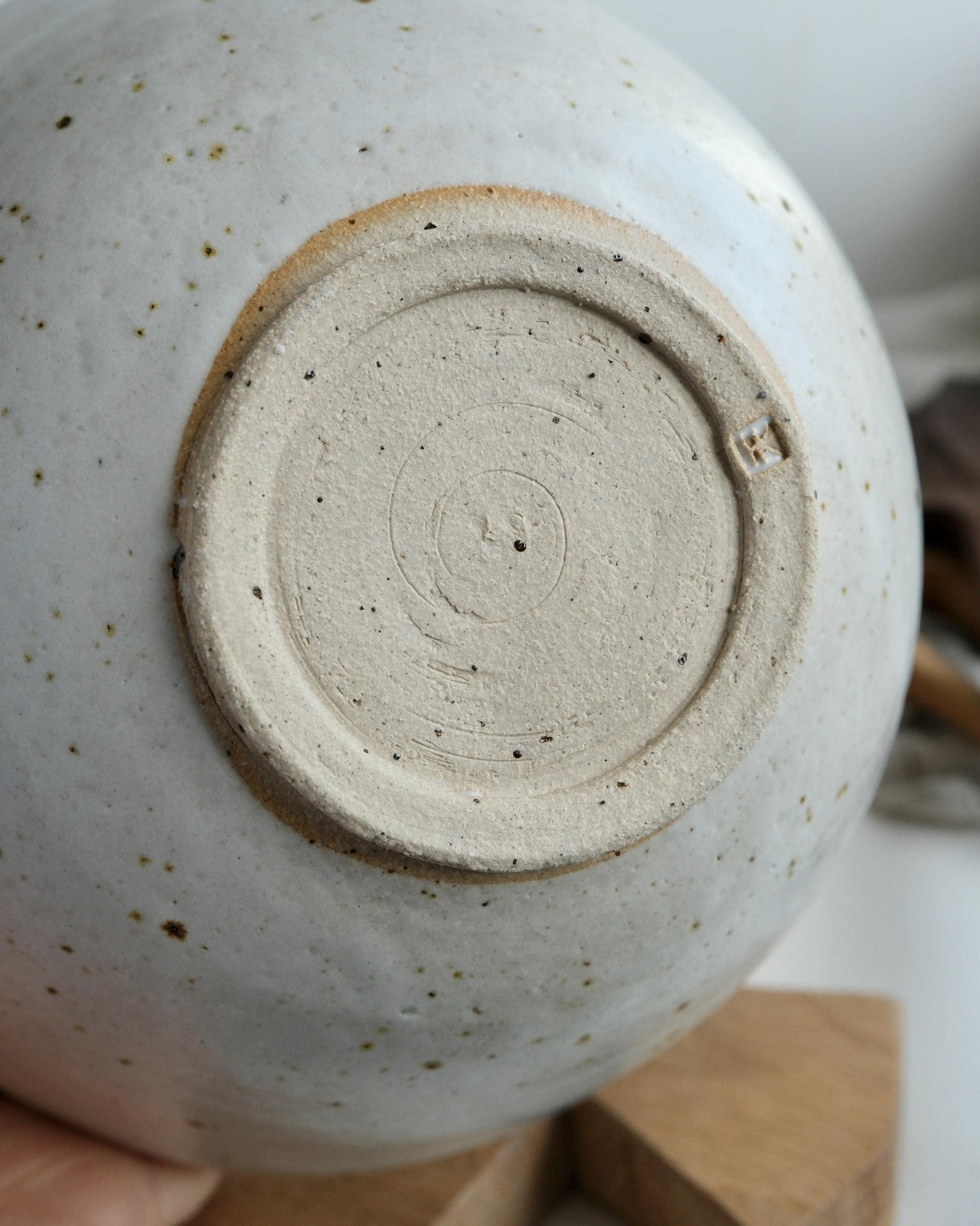 Close-up of a ceramic bowl with a textured surface
